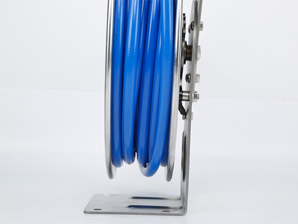 A detailed bottom view of a hose reel with a blue hose.