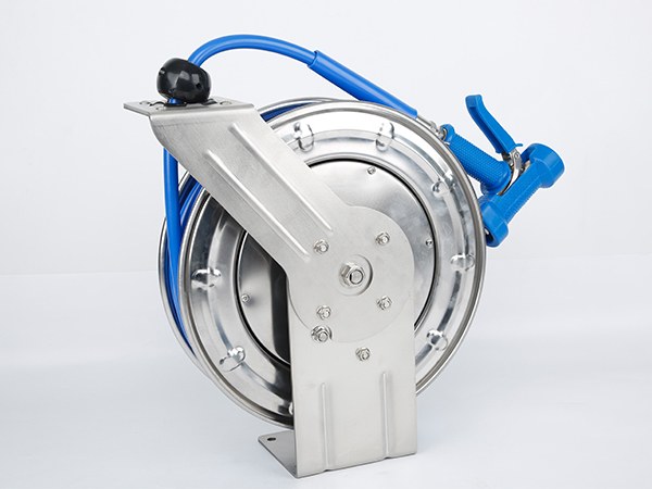 A hose reel with a blue hose.
