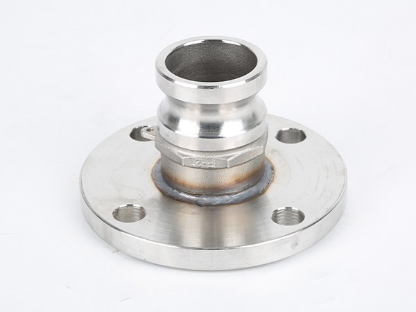 A male camlock on flange facing downwards, with visible pipe opening.