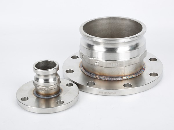 One large and one small male camlock flange.