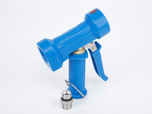 A vertical water down gun with an NPT male thread next to it.