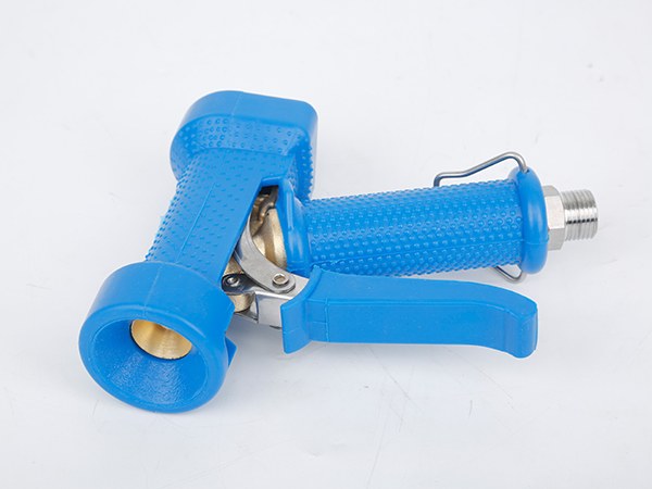 A lying water down gun with the nozzle facing sideways.