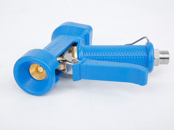 A lying water down gun with the nozzle facing the front.