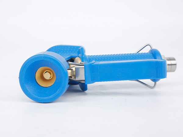 A lying water down gun with the nozzle facing the front.